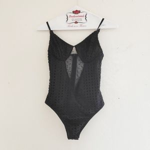 Mesh cutout black bodysuit